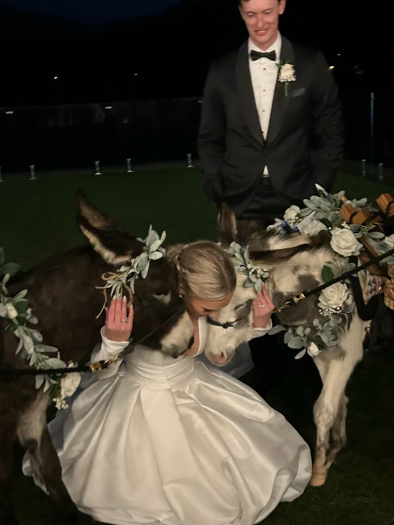 Bride embracing Peaches and Hickory at night